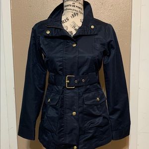 Girls lightweight navy raincoat.
